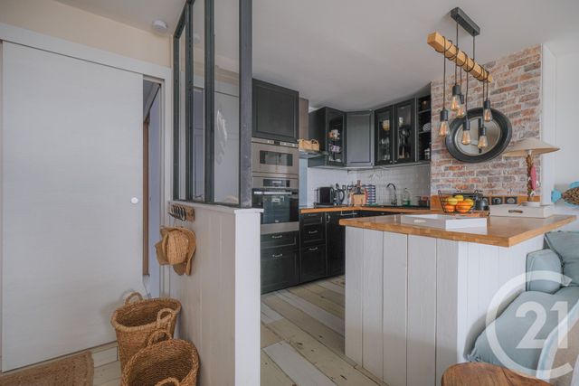 Appartement F3 à vendre - 3 pièces - 54.47 m2 - ST JEAN DE LA RIVIERE - 50 - BASSE-NORMANDIE - Century 21 Chevet Immobilier
